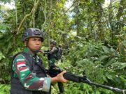 Ciptakan Kondisi Wilayah Aman, Personel Satgas Yonif 122/TS Pos Yetti Laksanakan Patroli