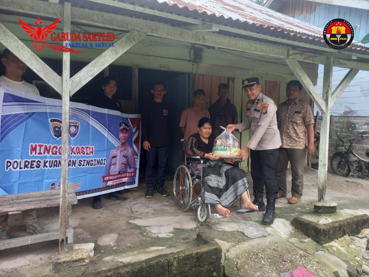 Polres Kuansing Gelar Minggu Kasih Pemberian Bansos di Desa Jake