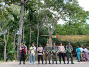 Pos Nelu Satgas Yonkav 6/Naga Karimata Berkolaborasi Dengan Pos Polisi Manamas dan Pastorat Amankan Acara Perarakan Patung Hati Kudus Yesus