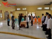 Polsek Kuantan Tengah Hadiri Pelantikan dan Pengambilan Sumpah Pengawas Kelurahan/Desa (PKD) Pemilu 2024