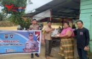 Polres Kuansing Gelar Minggu Kasih Pemberian Bansos di Desa Jake