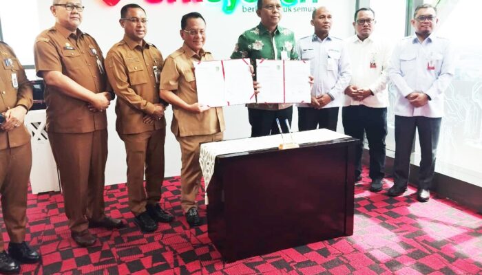 Bupati Rohil Teken MoU di Pekanbaru, Layanan Keuangan ASN Kini Berbasis Syariah