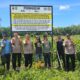 Kapolsek Bangkinang Barat Lakukan Pemasangan Plang Larangan di Lahan Bekas Kebakaran